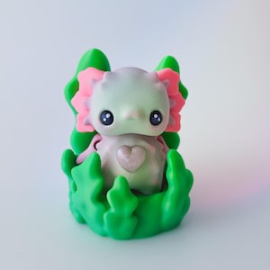 Juguete sensorial de ajolote articulado impreso en 3D: una adorable criatura fantástica para el escritorio.