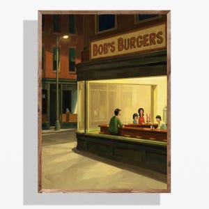May include: A framed print of a diner scene at night, with the sign "BOB'S BURGERS" above the window. Inside, a family sits at the counter. The artwork is in a style reminiscent of Edward Hopper's "Nighthawks."