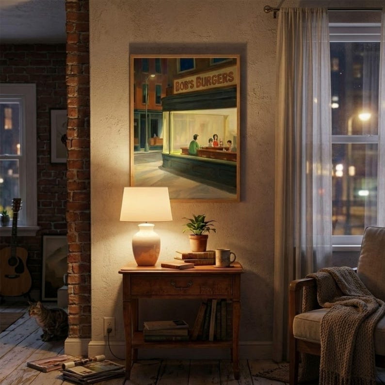 May include: A framed painting of a diner scene with the text "BOB'S BURGERS" above the entrance. A table lamp with a white shade sits on a wooden side table, next to a small potted plant and books. A guitar leans against a brick wall.