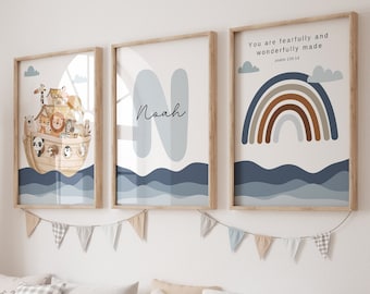 May include: Three framed prints with a nautical theme. The first print features a cartoon illustration of Noah's Ark with animals on board. The second print features the name Noah in a blue and white font. The third print features a rainbow with the text "You are fearfully and wonderfully made" and a scripture reference.
