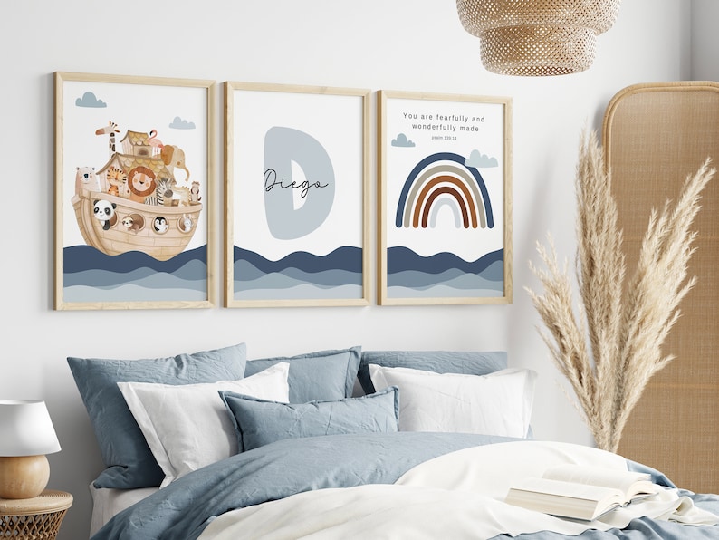 May include: Three framed prints with a nautical theme. The first print features a cartoon illustration of Noah's Ark with animals on board. The second print features a blue letter D with the name "Diego" written in cursive. The third print features a rainbow with brown, orange, and gray stripes and the text "You are fearfully and wonderfully made, Psalm 139:14".