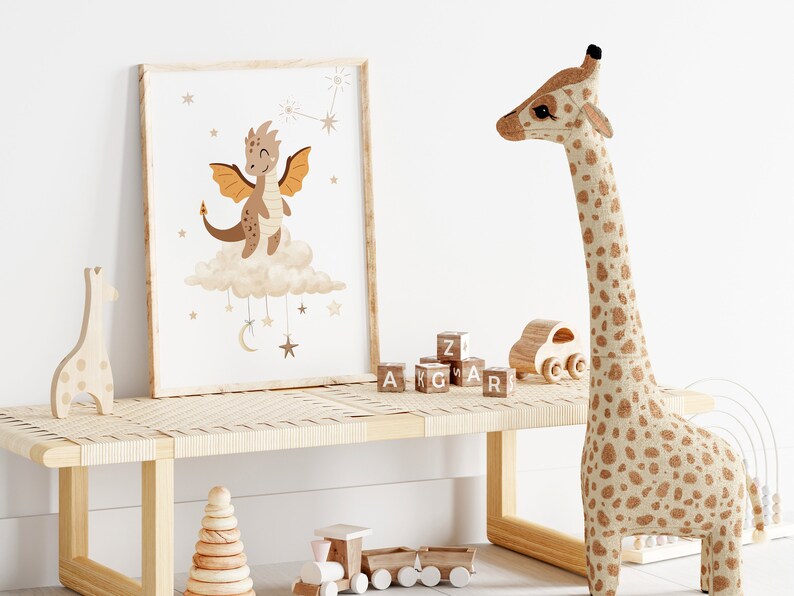 May include: A framed print of a cartoon brown dragon with orange wings on a cloud with stars and a crescent moon. The print is hanging on a wall above a wooden bench with a giraffe toy and wooden blocks that spell out "ZIG ZAG".