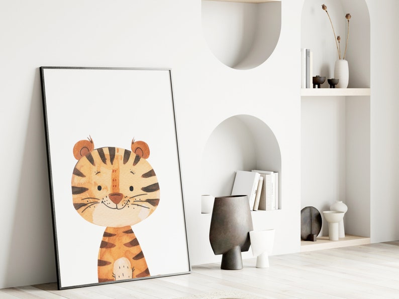 May include: A framed print of a cartoon tiger with orange and brown stripes. The tiger has a friendly expression and is looking directly at the viewer.