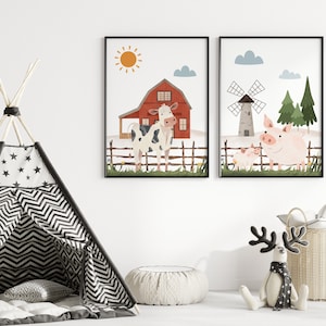 May include: Two framed illustrations of farm animals. The first illustration shows a red barn with a cow standing in front of it. The second illustration shows a windmill with a pig and a smaller piglet standing in front of it.