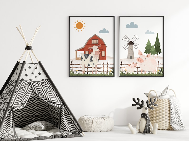 May include: Two framed illustrations of farm animals. The first illustration shows a red barn with a cow standing in front of it. The second illustration shows a windmill with a pig and a smaller piglet standing in front of it.