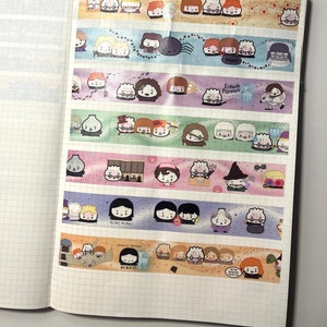 May include: A collection of colorful washi tapes featuring illustrations of characters from the Harry Potter series. The tapes feature various scenes and quotes from the books, including "Always" and "Expecto Patronum".