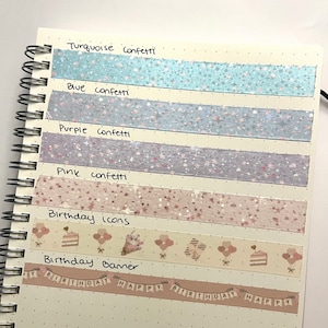 May include: A collection of washi tapes featuring different designs, including turquoise, blue, purple, and pink confetti, birthday icons, and a birthday banner that reads "Happy Birthday".