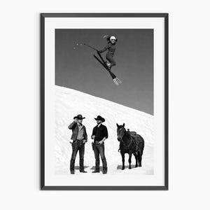 May include: Black and white framed print featuring a skier mid-air above a snowy slope. Two cowboys stand below, with a saddled horse. The image has a vintage, artistic aesthetic.