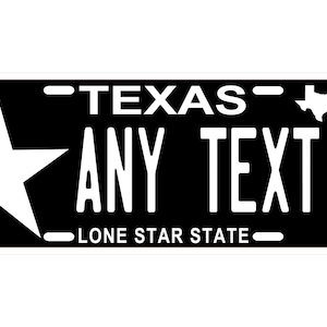 May include: Black and white Texas license plate with a white star on the left side and a white outline of Texas on the right. The text reads "TEXAS" above "ANY TEXT" and "LONE STAR STATE".