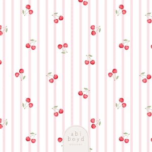Puede incluir: Patrón repetido de cerezas rojas con tallos y hojas verdes sobre un fondo blanco con rayas rosas verticales. El diseño incluye el texto "abi boyd DESIGNS" en un rectángulo redondeado.