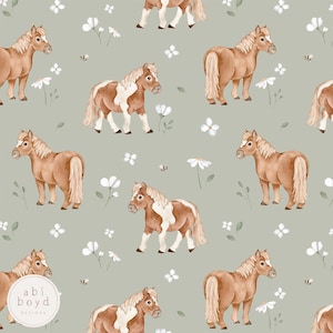 Puede incluir: Un patrón sin costuras con caballos marrones y blancos con flores blancas sobre un fondo verde claro. El patrón es perfecto para telas, papel tapiz o papel de regalo.
