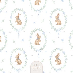 May include: A repeating pattern of watercolor bunnies inside oval wreaths with blue bows and flowers. The bunnies are light brown with blue ribbons around their necks. The background is white with scattered leaves and flowers.