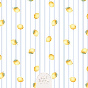 May include: A repeating pattern of yellow lemons with green leaves scattered across a white background with vertical light blue stripes. The lemons are watercolor style. The text "abi boyd DESIGNS" is in the lower right corner.