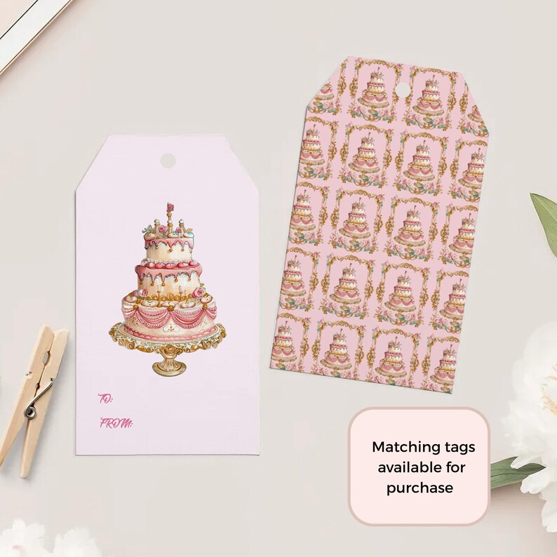 May include: Pink gift tag with a white border featuring a watercolor illustration of a three-tiered cake with pink and white frosting, gold accents, and a single candle on top. The tag has the words "To:" and "From:" printed on it.