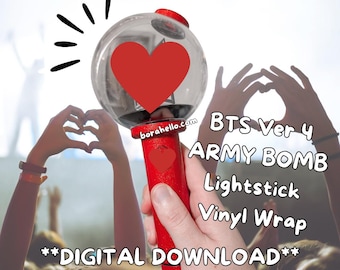 May include: A red and clear lightstick with a large red heart design. The lightstick has the text "BTS Ver 4 ARMY BOMB Lightstick Vinyl Wrap" and "**DIGITAL DOWNLOAD**". The lightstick is held up in front of a crowd.