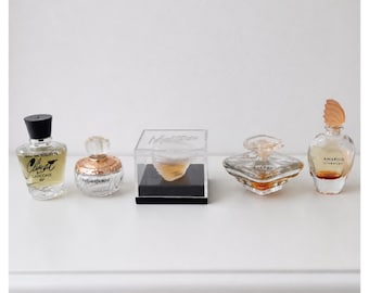 Vintage mini perfume bottle set featuring Lancome Climat Tresor Givenchy Amarige YSL Paris and Montana display collectible rare find gift