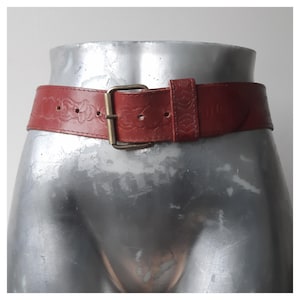 Vintage Red Leather Belt Embossed Floral Wide Statement Waist Belt Brass Buckle Handmade 1980s Retro Bohemian Festival Fashion Style glamour