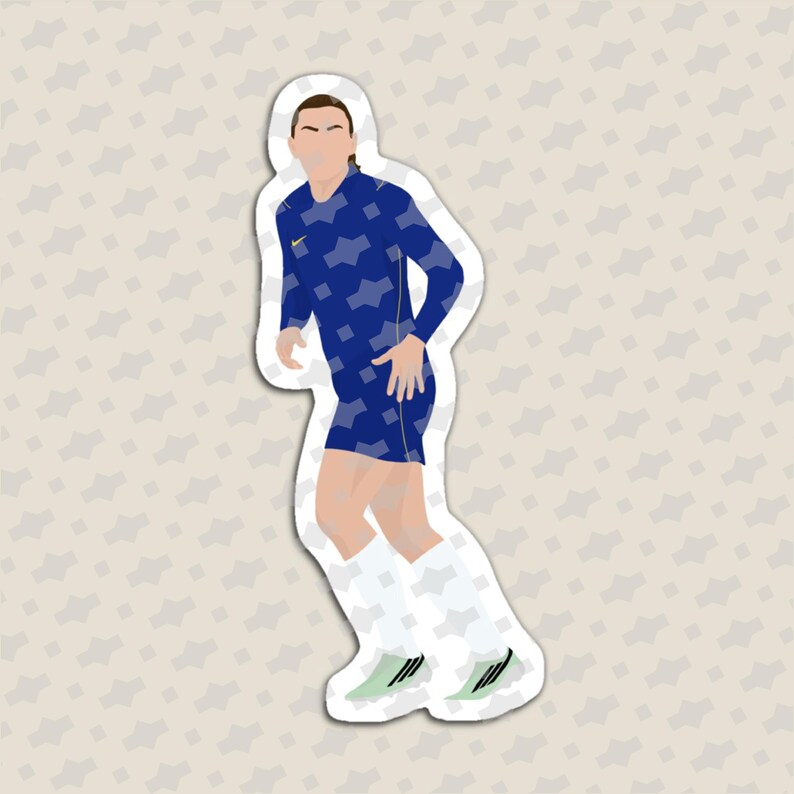 May include: A die-cut sticker featuring a stylized illustration of a soccer player wearing a blue long-sleeve jersey with a geometric pattern, blue shorts, white socks, and light green cleats. The player is depicted in a running pose.