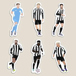 May include: Set of six stickers featuring stylized illustrations of soccer players in black and white striped jerseys. One player is in a light blue goalkeeper uniform. The stickers vary in pose and include a player with a soccer ball.