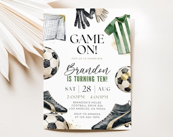 May include: A soccer-themed birthday invitation with the text "GAME ON!" and "Brandon IS TURNING TEN!" The design includes soccer balls, cleats, a goal, gloves, and a green and white striped jersey. The invitation is for a party on August 28th.