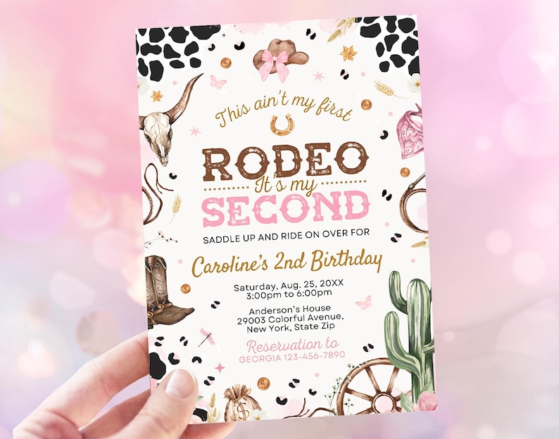May include: Pink and brown birthday invitation with a cowboy theme. The invitation says "This ain't my first Rodeo... It's my Second" and includes the text "Saddle up and ride on over for Caroline's 2nd Birthday".