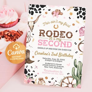 May include: A pink and brown invitation for a second birthday party with a rodeo theme. The invitation features a cowboy hat, boots, a cactus, and a wagon wheel. The text on the invitation reads "This ain't my first rodeo. It's my second. Saddle up and ride on over for Caroline's 2nd Birthday."