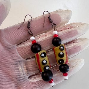 Vintage African Trade Eyed Beads Pierced Earrings with Yellow black red dangle and drop handmade jewellery 1970s