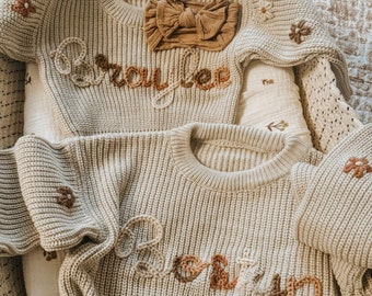 手刺繍ベビーセーター：パーソナライズされた新生児ギフト