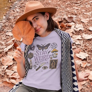 Stay Weird Magic Graphic Tee