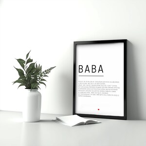 May include: Black and white framed print with the word "BABA" in large letters at the top. The text below defines the word "BABA" in Turkish.
