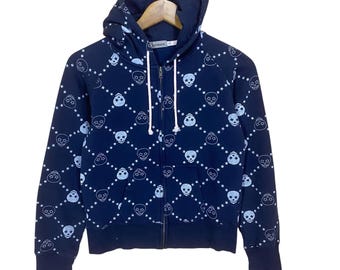 ¡¡RARO!! Sudadera con capucha y cremallera con estampado completo de calaveras Sorridere, talla pequeña