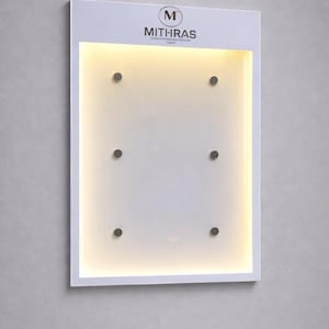 White illuminated wall menu display with a frosted acrylic front and integrated backlighting. Custom LED menu box for restaurant entrances, hotel reception areas, bars and evening dining establishments.