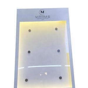 White LED wall mounted menu sign with a large illuminated central panel and custom printed header area. Modern backlit display board for restaurant menus, hotel directories and commercial information signage.
