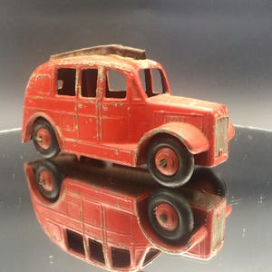 Vintage Dinky Toys Fire Engine model for restoration
