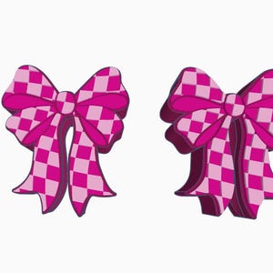 May include: Two decorative bows in a vibrant pink hue, featuring a checkered pattern in lighter pink squares. The bows have a 3D effect, with shadows adding depth. The design is symmetrical, with each bow having loops and streamers.