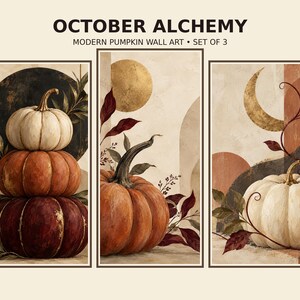 May include: A set of three vertical wall art prints titled OCTOBER ALCHEMY MODERN PUMPKIN WALL ART SET OF 3. The first print shows a stack of white, orange, and dark red pumpkins. The second shows an orange pumpkin with leaves. The third shows a white pumpkin with a crescent moon.