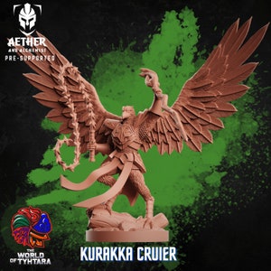 May include: A 3D printed miniature of a bird-like creature with wings outstretched, holding a whip in one hand and a staff in the other. The miniature is painted in a brown color and is standing on a base. The text "KURAKKA CRUIER" is printed below the miniature.