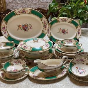 An Antique Myott Staffordshire “Bouquet “ dinner set