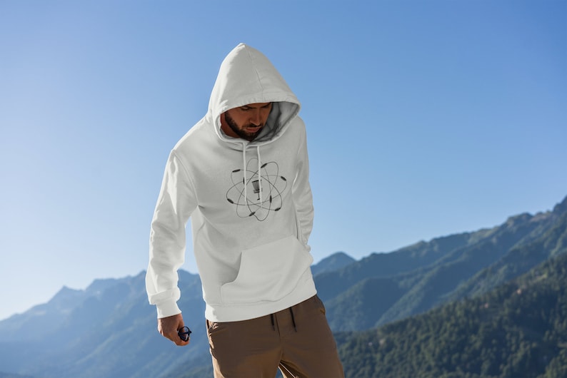 May include: White hooded sweatshirt with a black and white graphic of a disc golf basket inside an atom symbol.