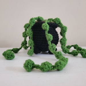 Crochet string of pearls plant in cauldron