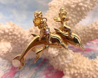 カークス フォリー ゴールドトーン 天使がイルカに乗ったブローチ