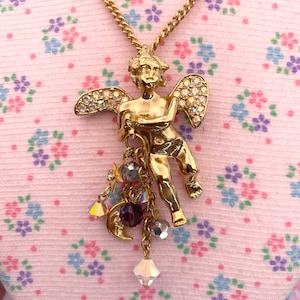 Kirk&#39;s Folly Golden Cherub With Moon & Star Charms Long Pendant Necklace