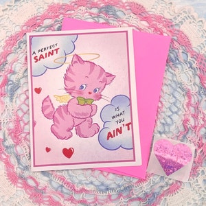 Tarjeta de San Valentín con gatito angelical/diabólico enviado del cielo, con sobre y pegatina de corazón