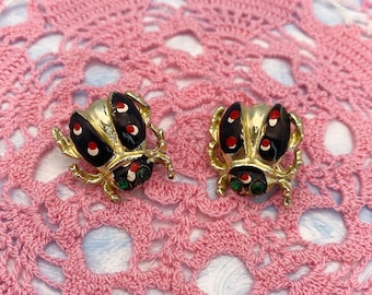 Pair Of Vintage Ladybug Pins With Black and Red Enamel and Green Crystal Eyes 1970s