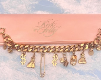 Pulsera con dije vintage "Million Dollar Baby" de Kirk's Folly en tono dorado