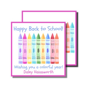 May include: A pink and white card with the text "Happy Back to School!" and a row of colorful crayons. The card also includes the text "Wishing you a colorful year!" and "Daley Hainsworth".