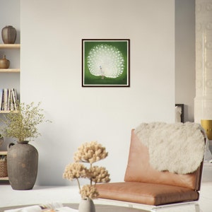 May include: A framed print of a white peacock with its tail feathers spread out against a green background.