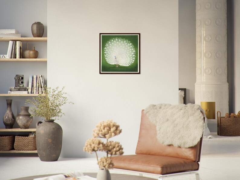 May include: A framed print of a white peacock with its tail feathers spread out against a green background.