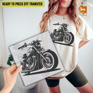 May include: A black and white illustration of a motorcycle. The motorcycle has a large front tire and a smaller back tire. The motorcycle is on a white background.