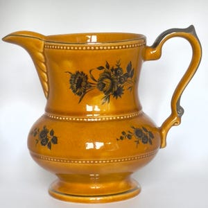 1950s Lord Nelson Ware Elijah Cotton Glazed Pitcher Staffordshire, England • Amber w Black Rose Motif, Silver design Ceramic Water Jug